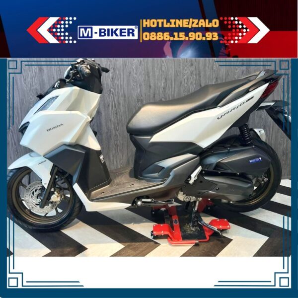 Ben nâng chân chống giữa mbiker