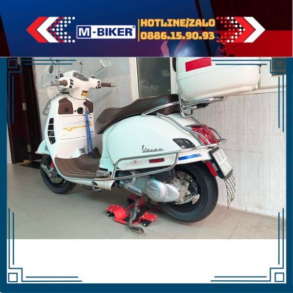 Ben nâng chân chống giữa mbiker