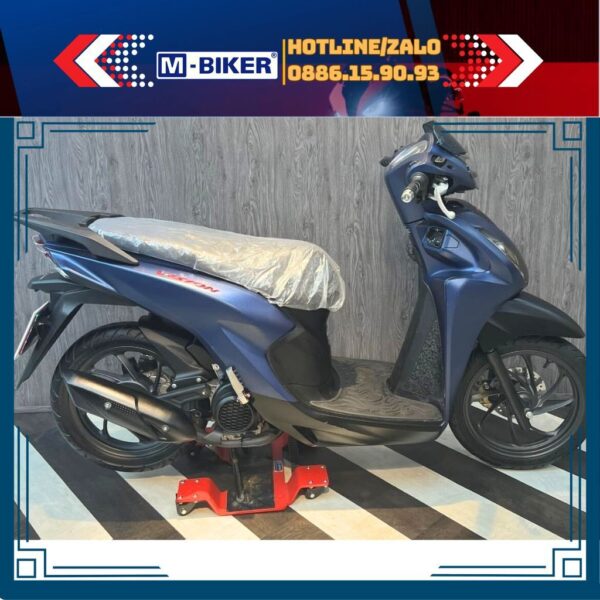 Ben nâng chân chống giữa mbiker