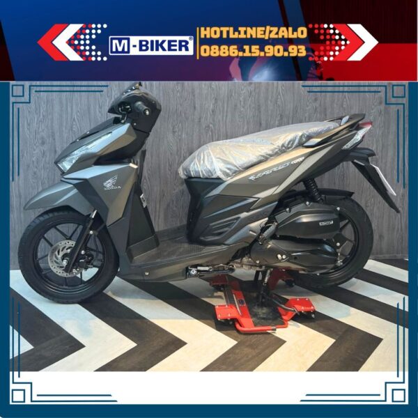 Ben nâng chân chống giữa mbiker